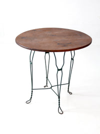 mid-century wrought iron bistro table