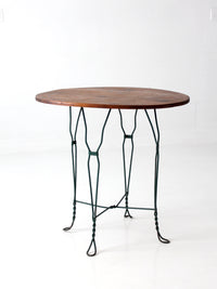 mid-century wrought iron bistro table