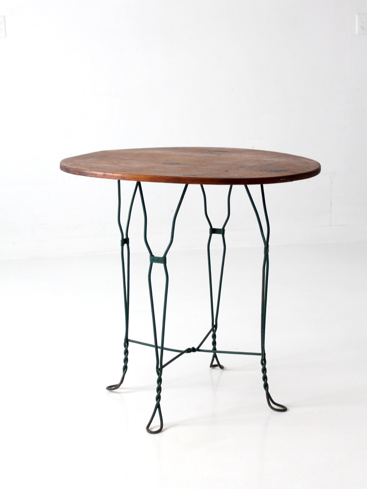 mid-century wrought iron bistro table