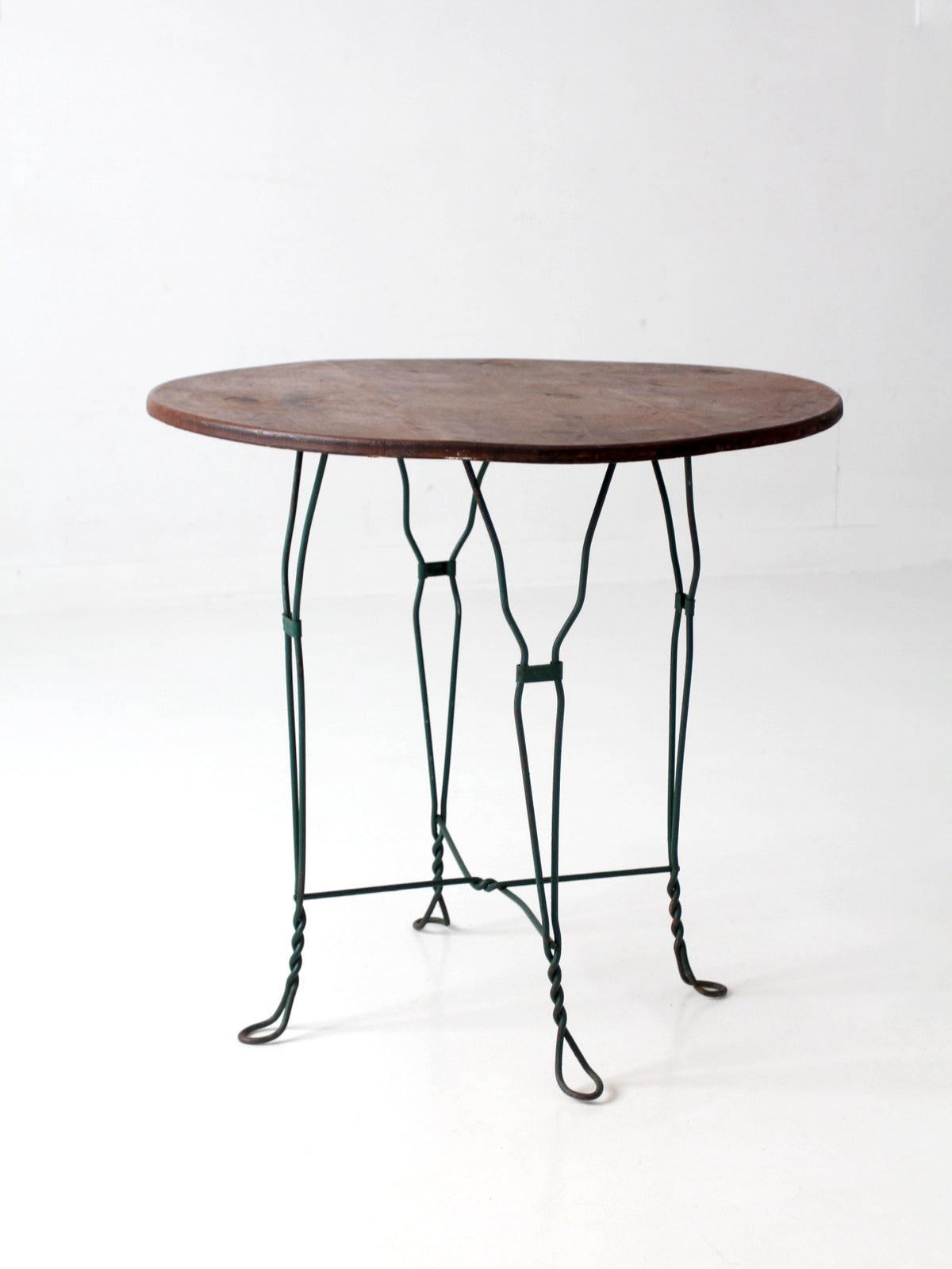 mid-century wrought iron bistro table