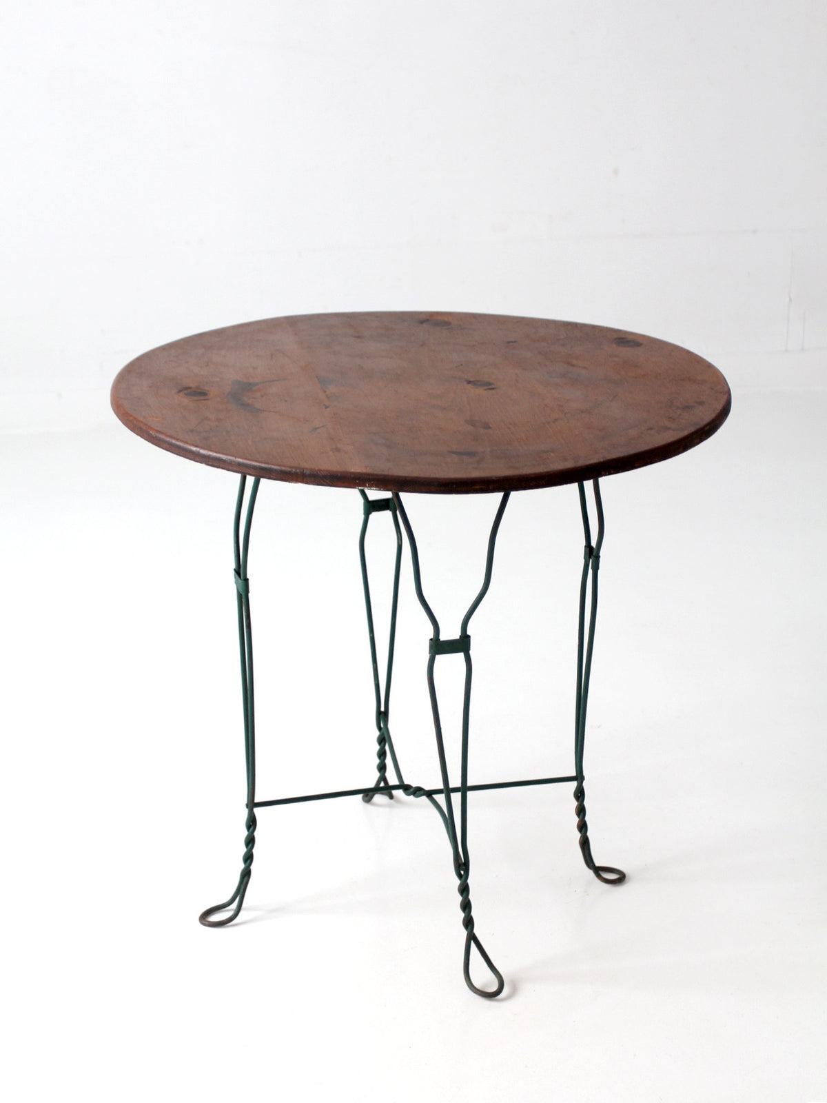 mid-century wrought iron bistro table