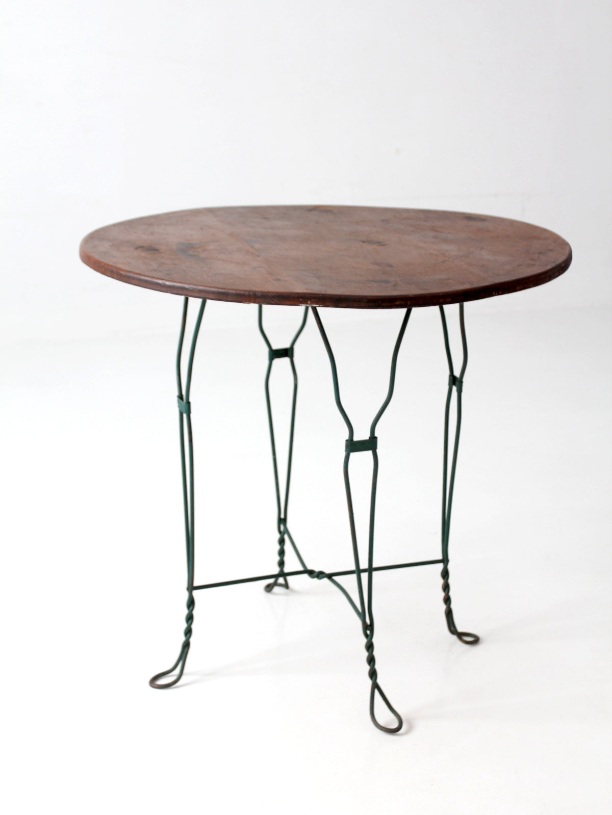 mid-century wrought iron bistro table