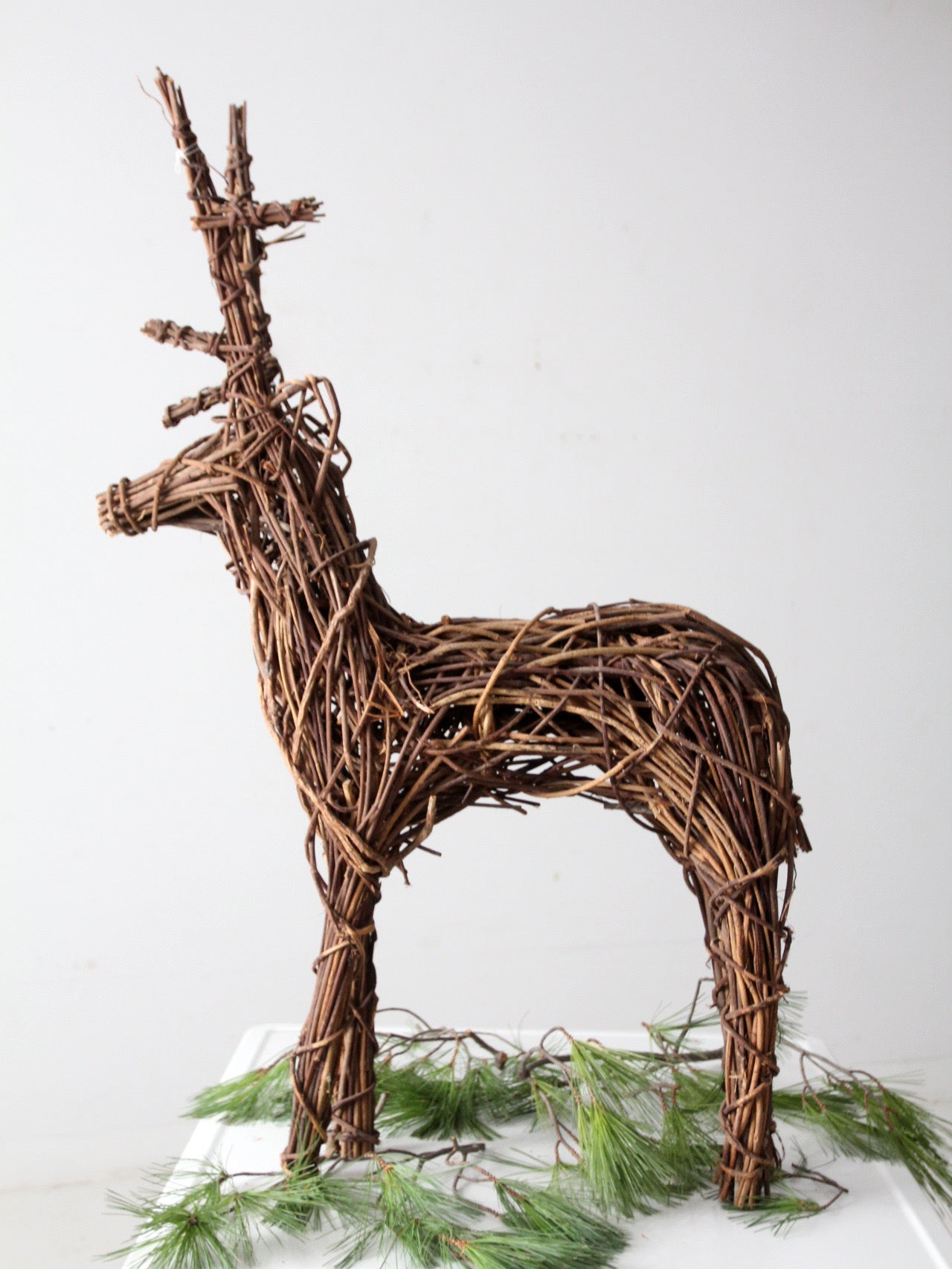 vintage wicker reindeer sculpture