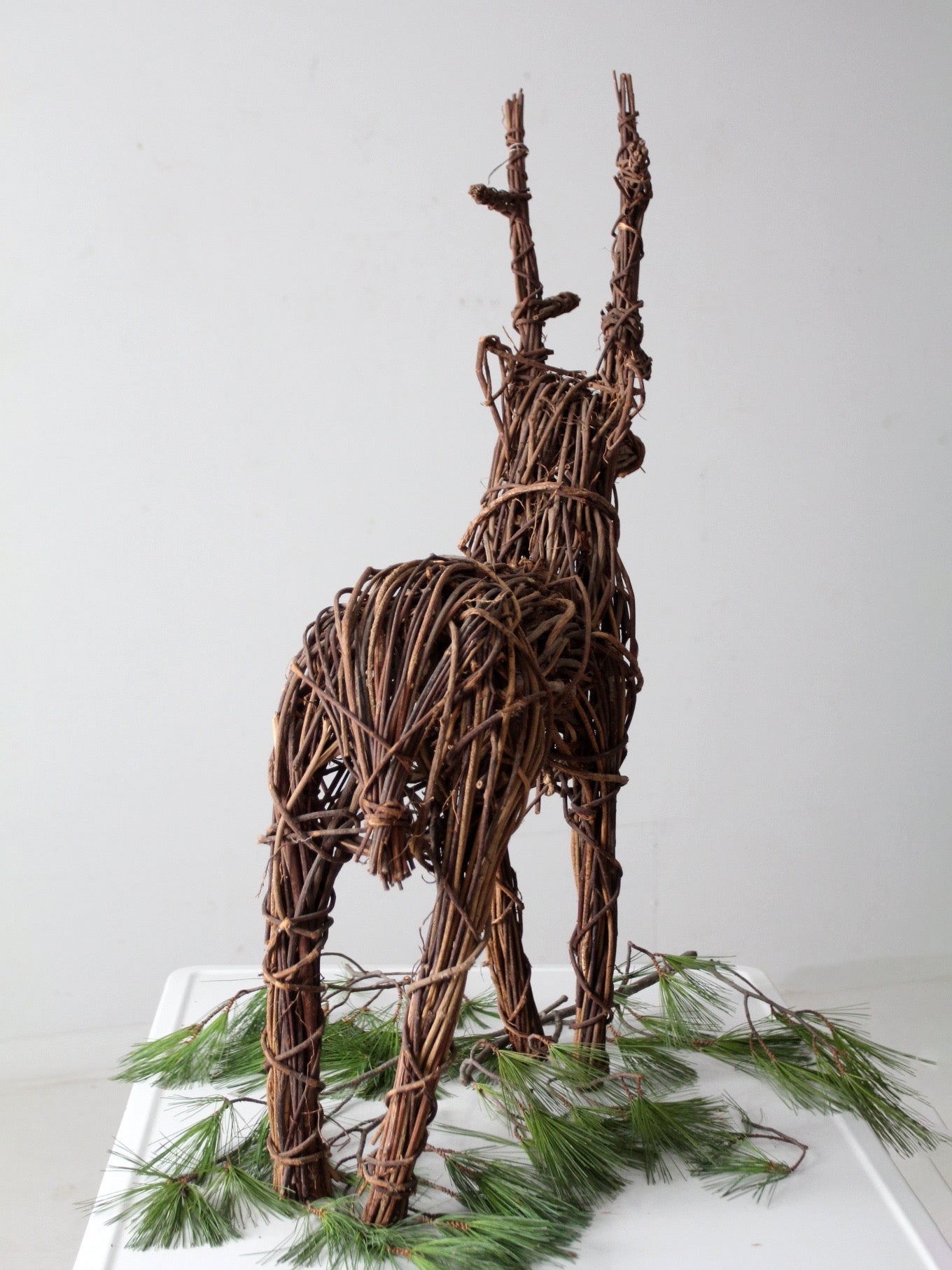 vintage wicker reindeer sculpture