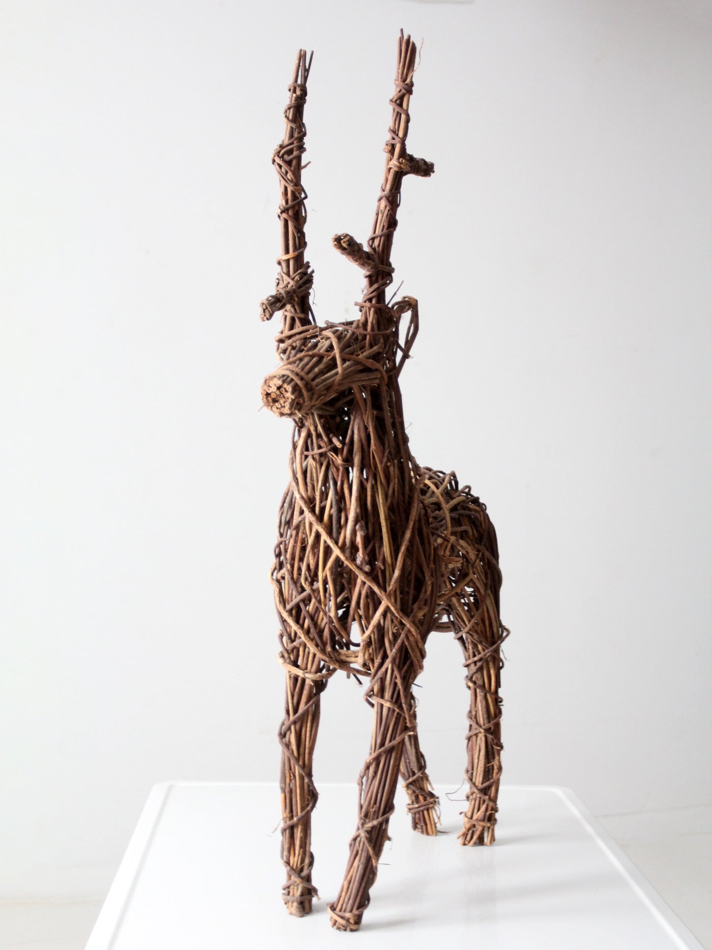 vintage wicker reindeer sculpture