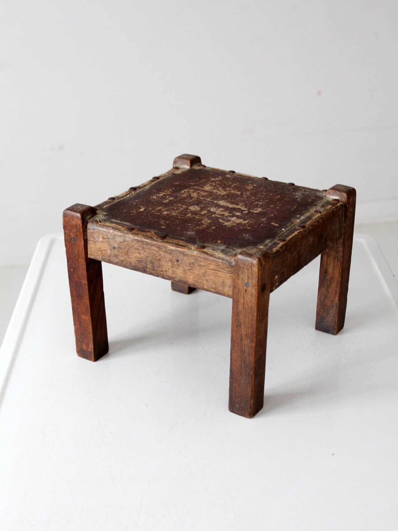 turn of the century upholstered wood footstool