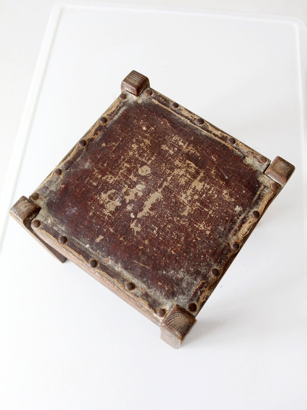 turn of the century upholstered wood footstool