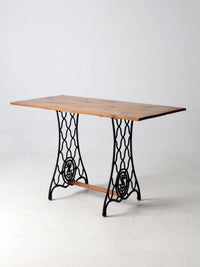 vintage Singer iron base table with wood top