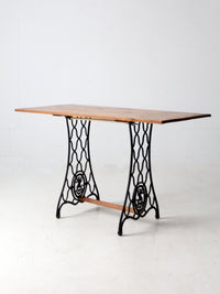vintage Singer iron base table with wood top