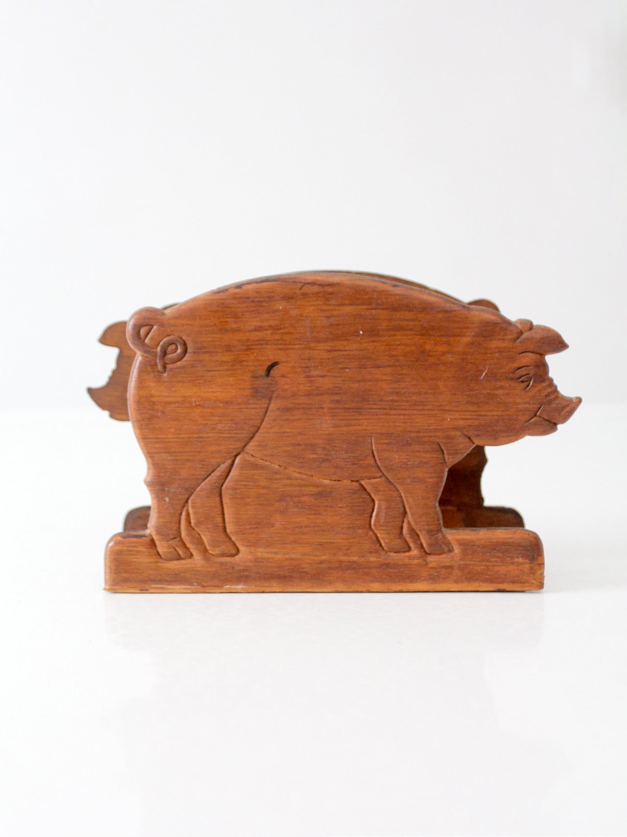 vintage folk art carved wooden pig napkin holder