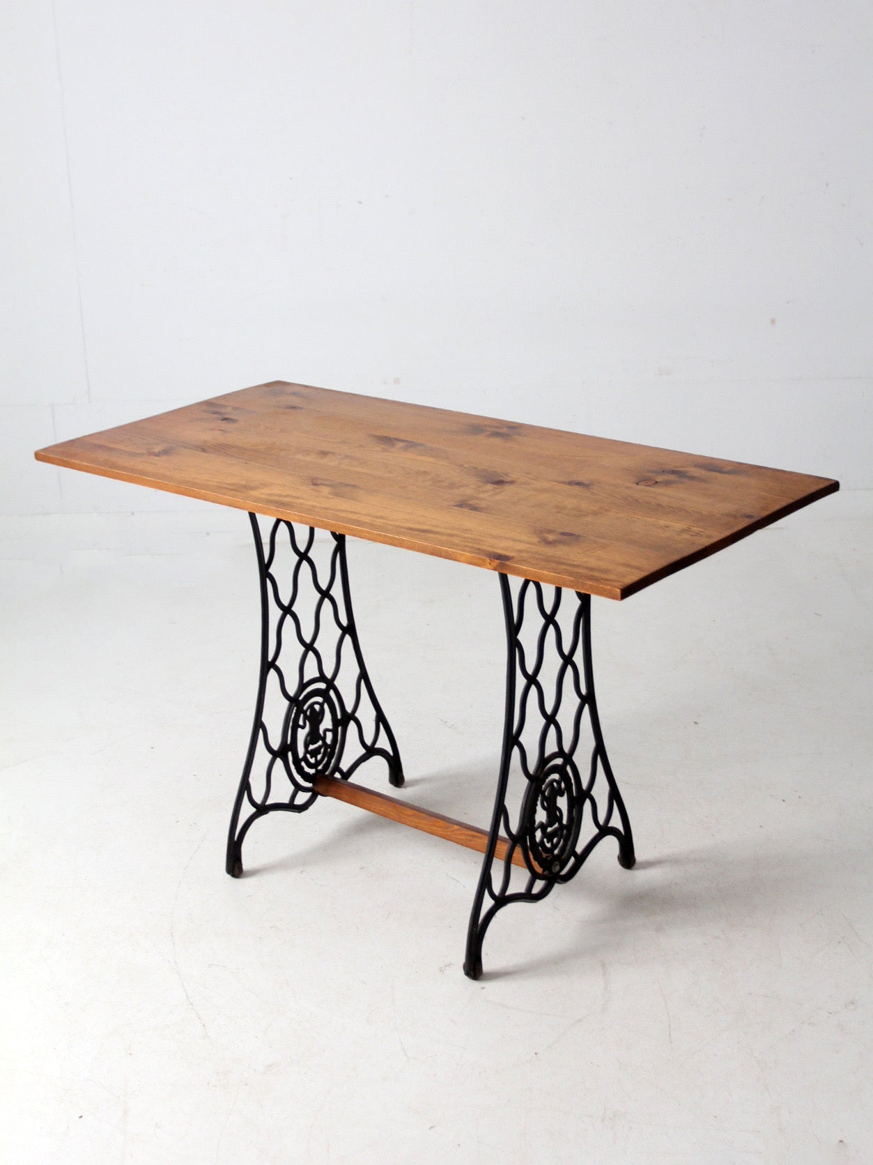 vintage Singer iron base table with wood top