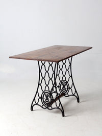 vintage Singer iron base table with wood top
