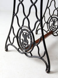 vintage Singer iron base table with wood top