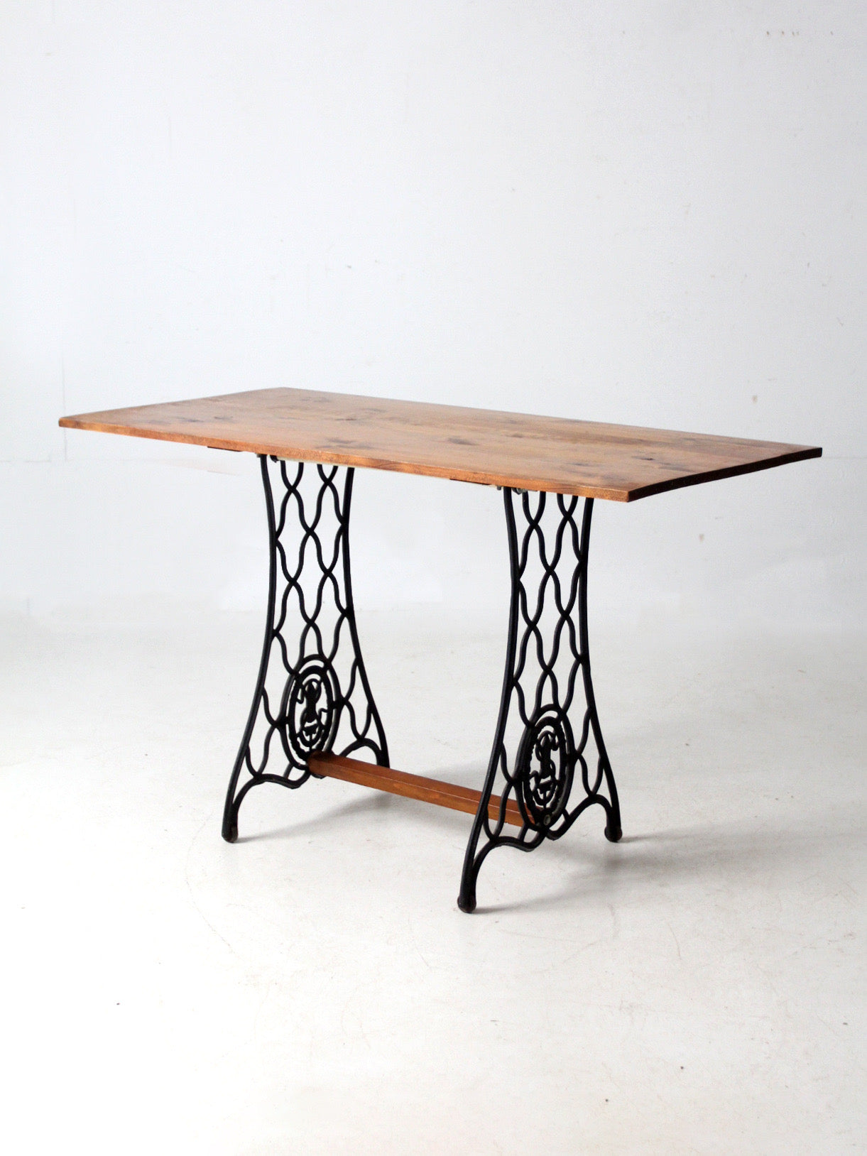 vintage Singer iron base table with wood top