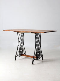 vintage Singer iron base table with wood top