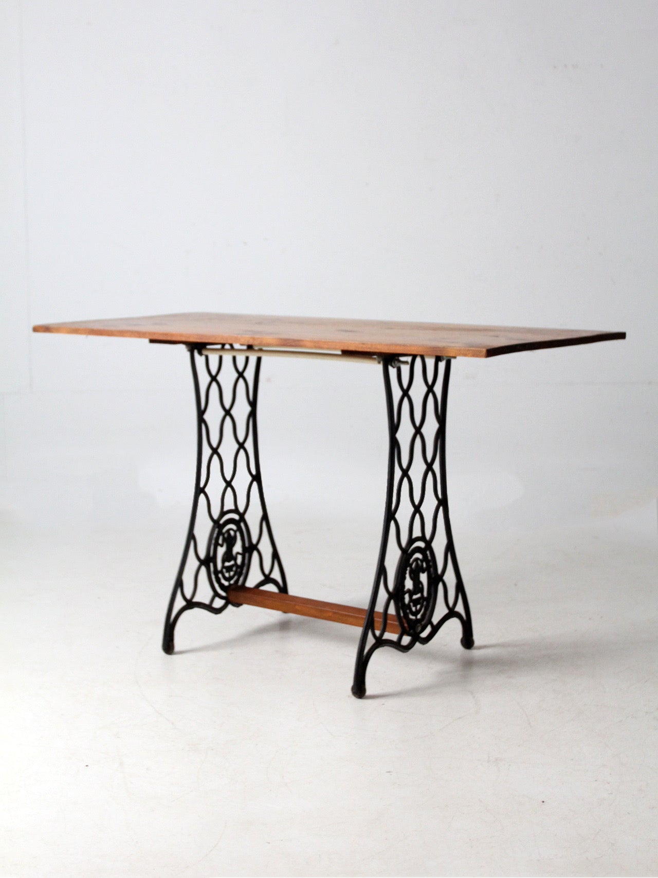 vintage Singer iron base table with wood top