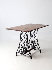 vintage Singer iron base table with wood top