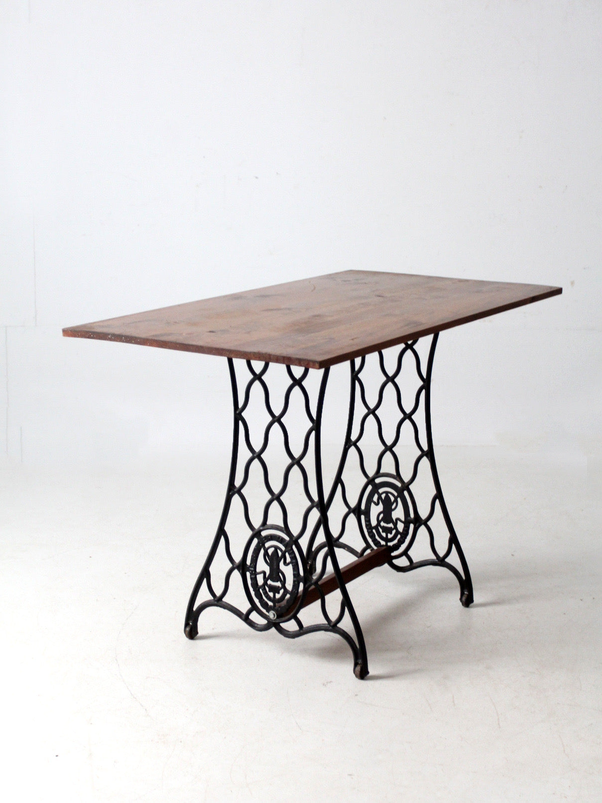vintage Singer iron base table with wood top