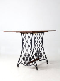 vintage Singer iron base table with wood top