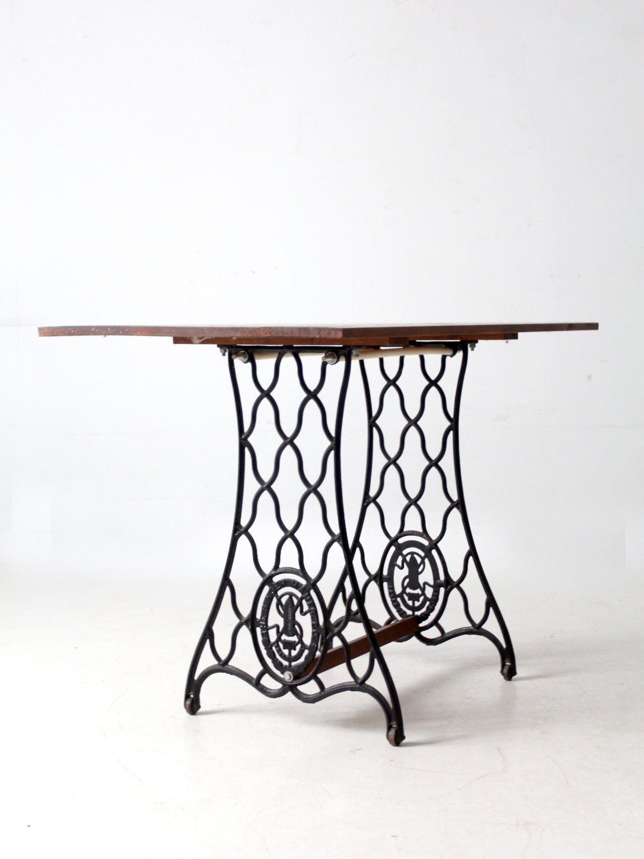 vintage Singer iron base table with wood top