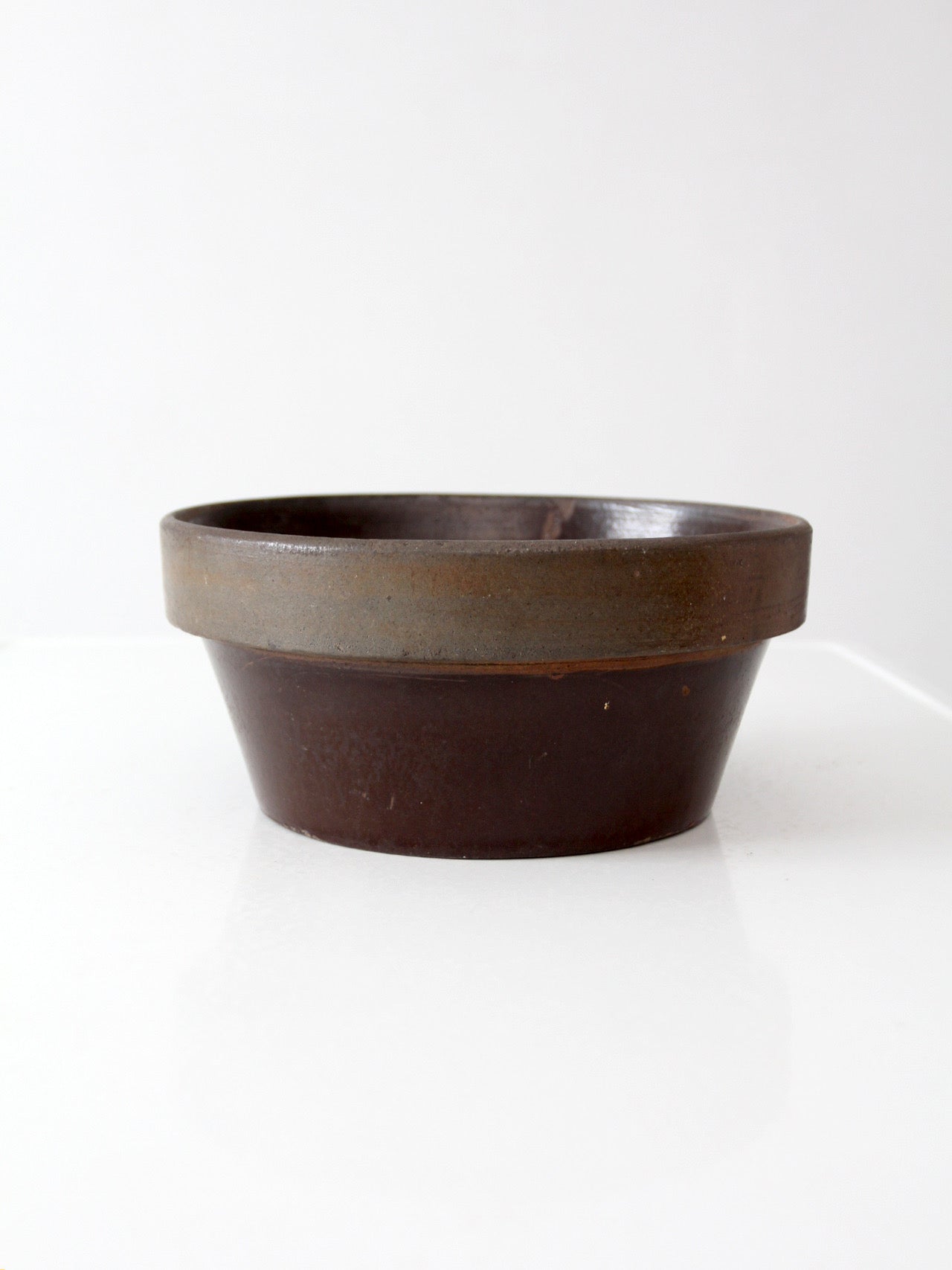 antique American stoneware mixing bowl with brown glaze