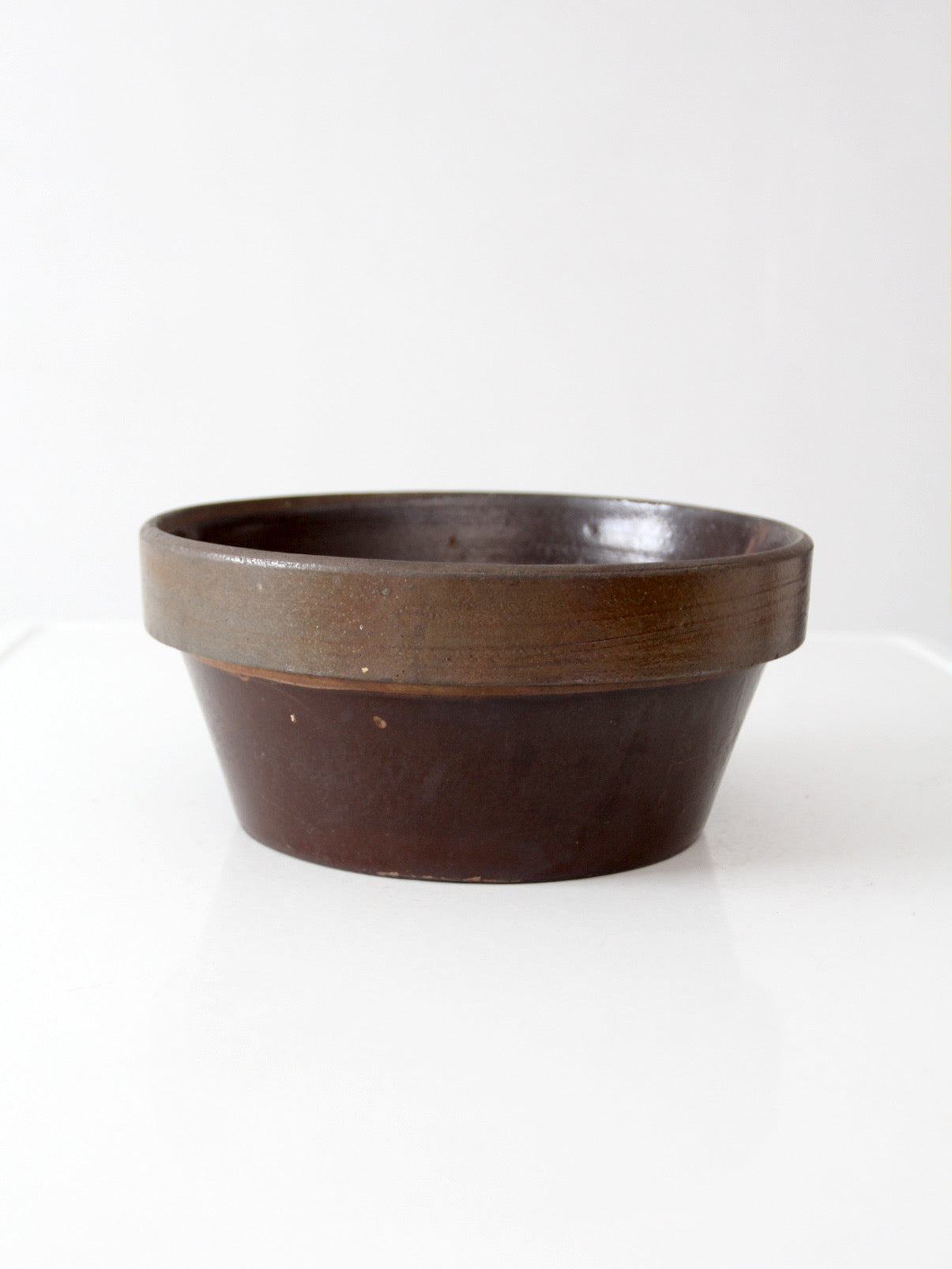 antique American stoneware mixing bowl with brown glaze