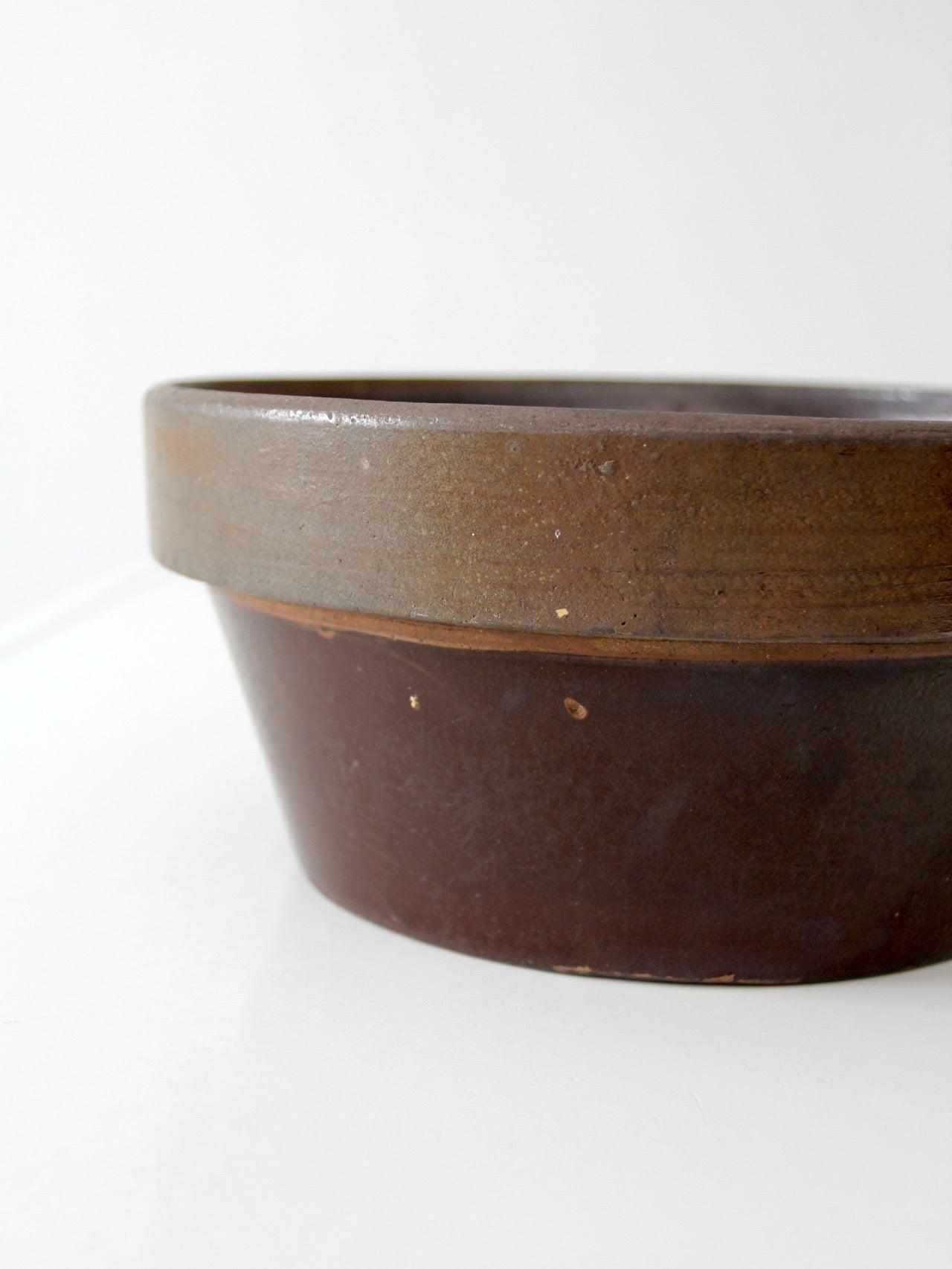 antique American stoneware mixing bowl with brown glaze