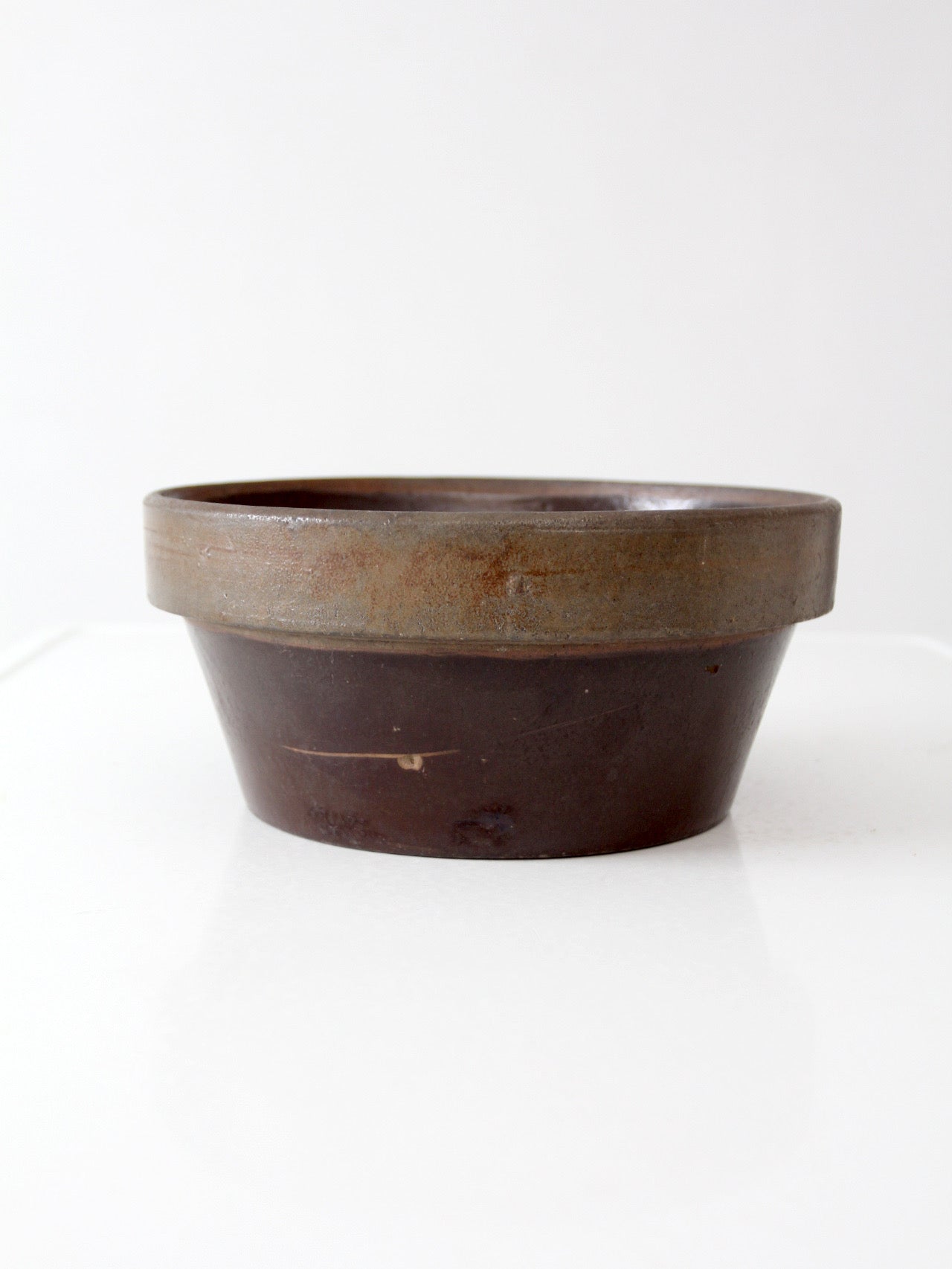 antique American stoneware mixing bowl with brown glaze