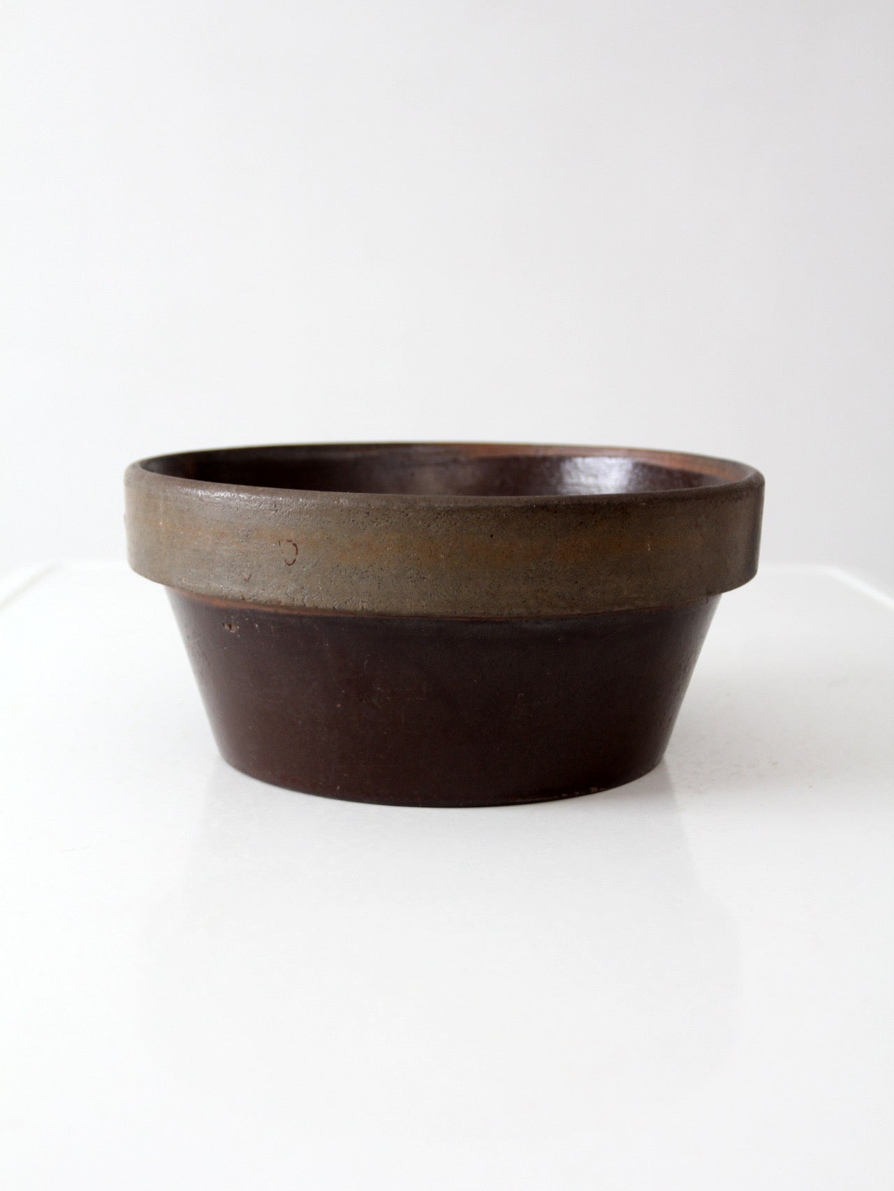 antique American stoneware mixing bowl with brown glaze