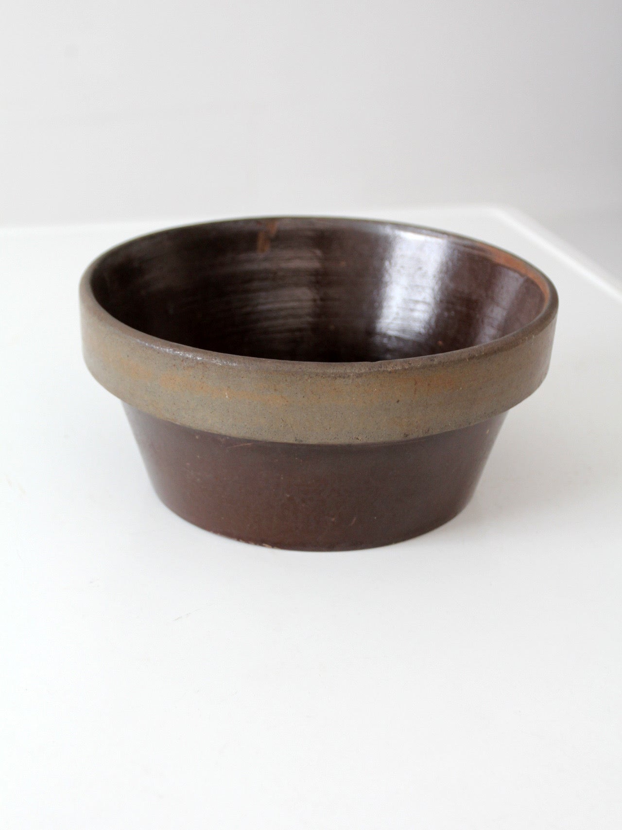 antique American stoneware mixing bowl with brown glaze