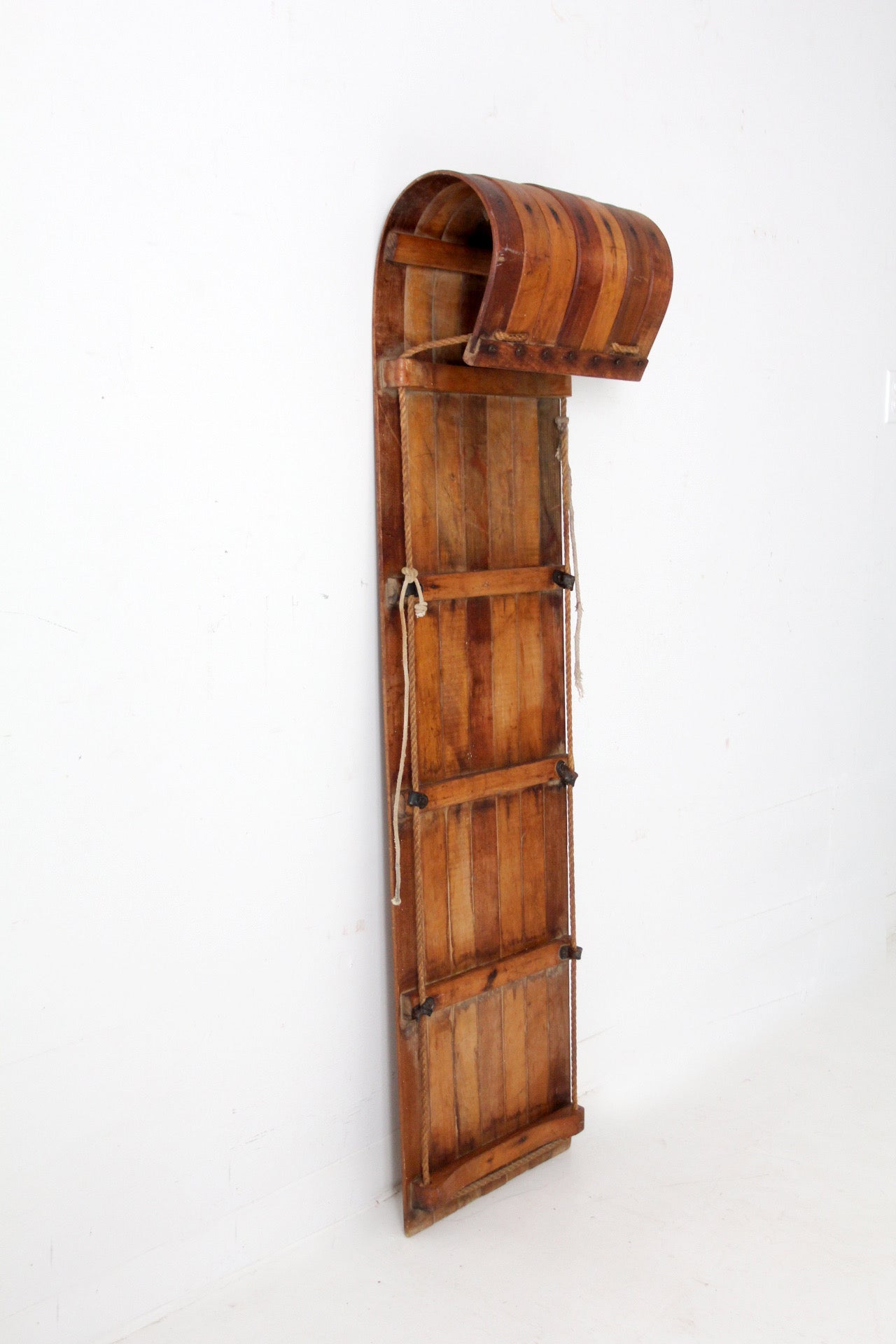 mid-century wooden toboggan