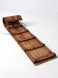 mid-century wooden toboggan