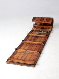 mid-century wooden toboggan