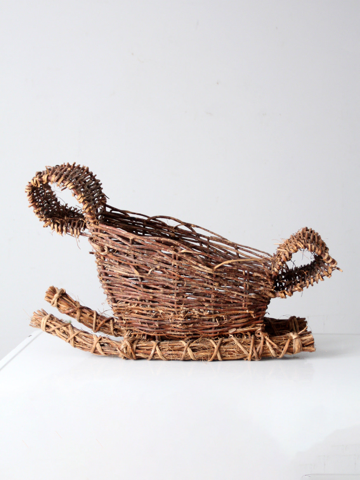 vintage wicker sleigh basket