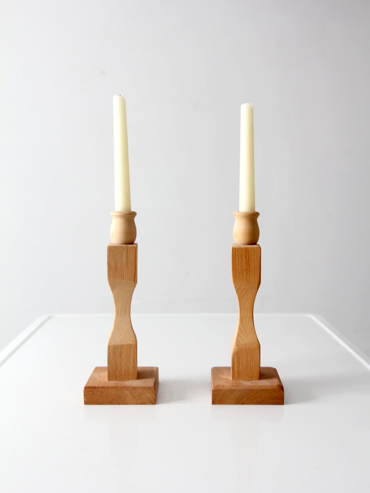 pair of vintage handmade wooden candlesticks