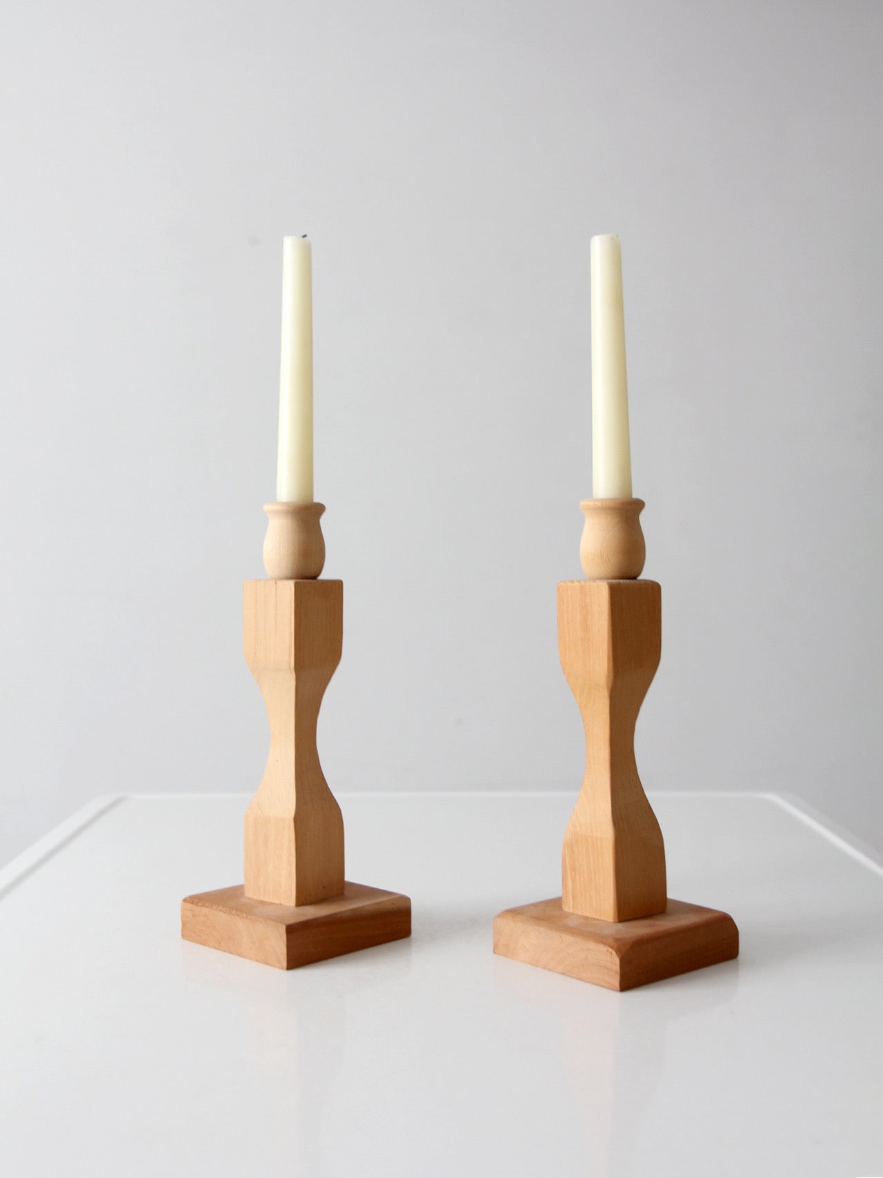 pair of vintage handmade wooden candlesticks