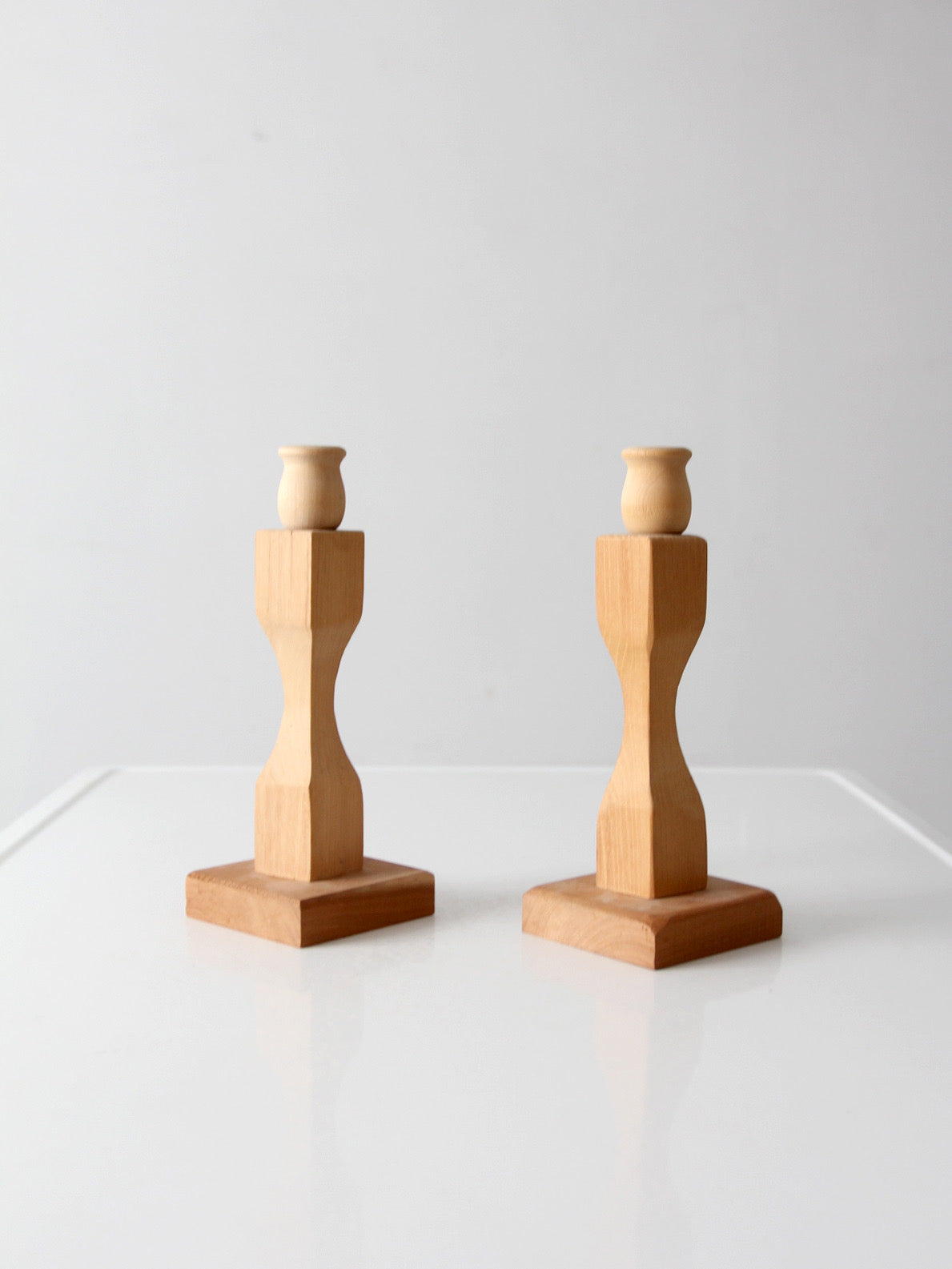 pair of vintage handmade wooden candlesticks