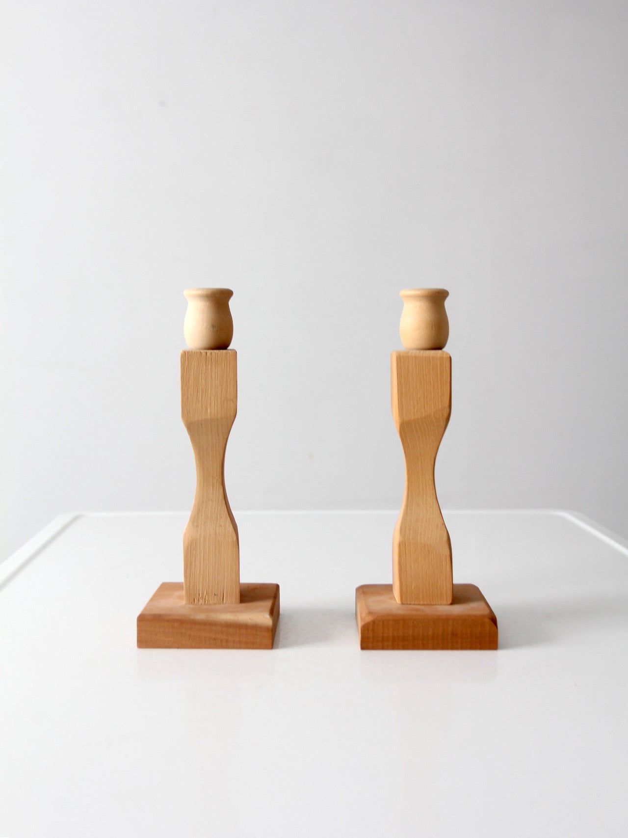 pair of vintage handmade wooden candlesticks