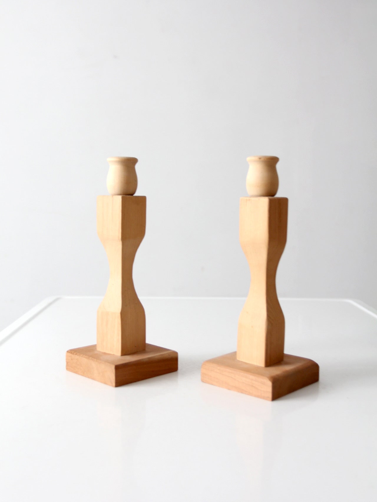 pair of vintage handmade wooden candlesticks