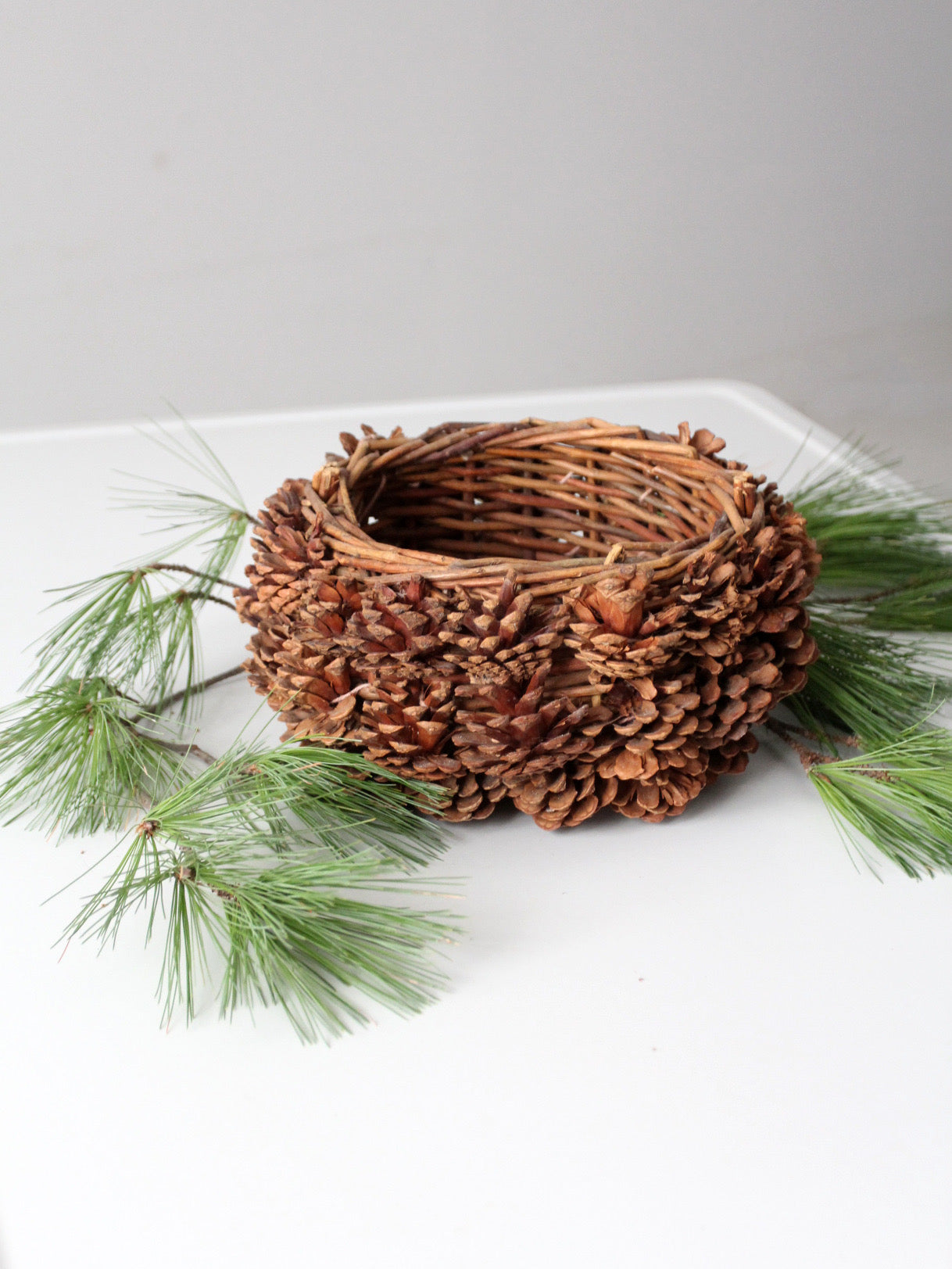 vintage handmade pinecone basket