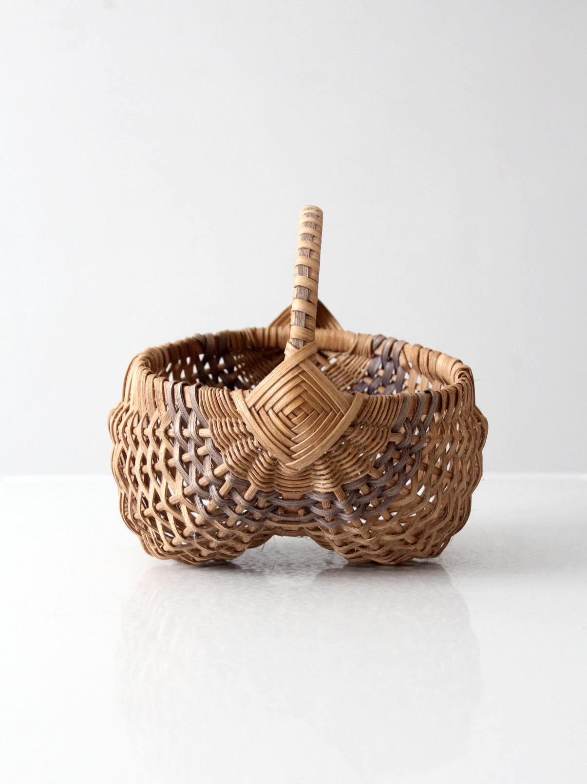 vintage handmade buttocks basket