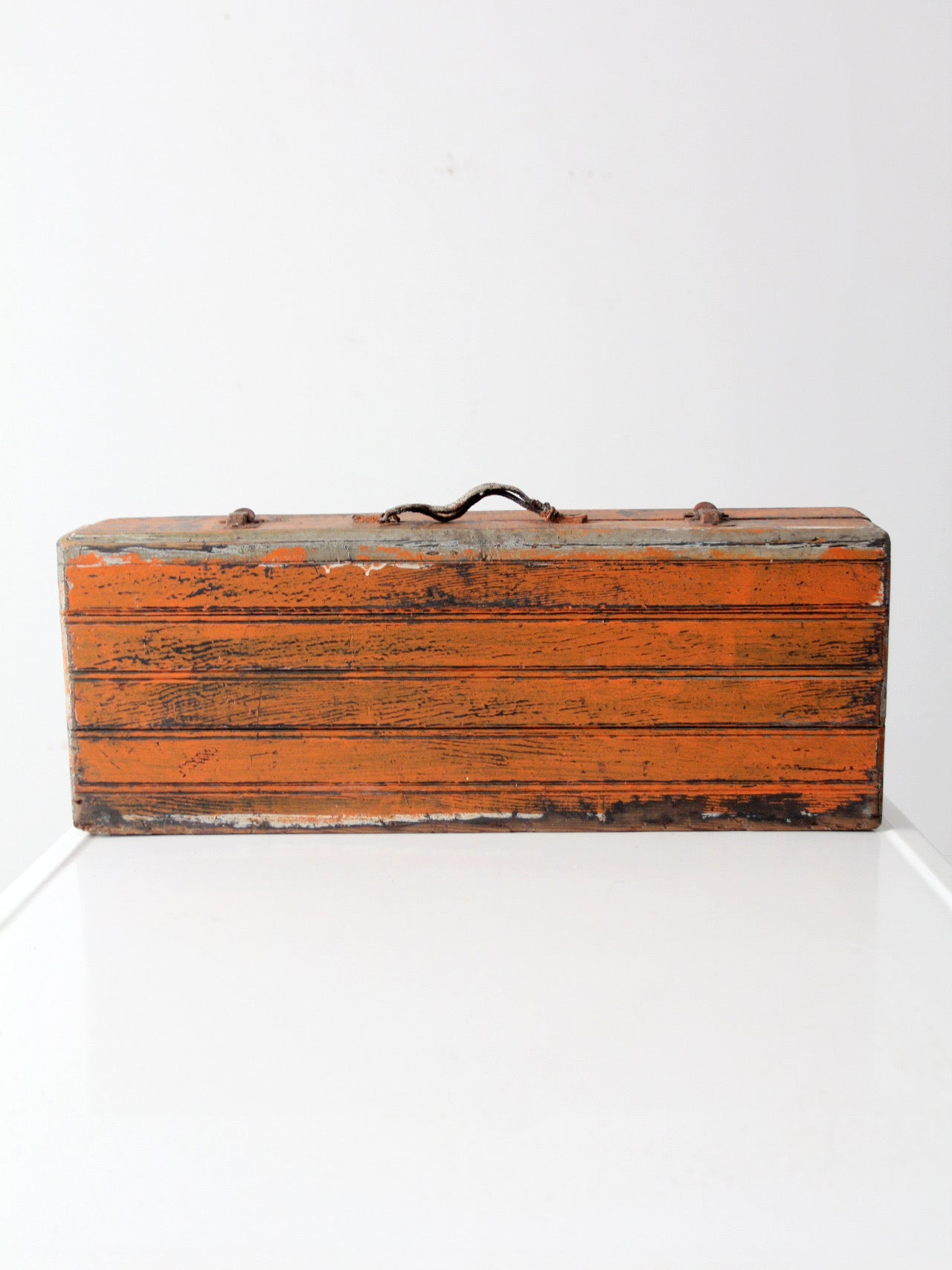 vintage orange wooden tool box