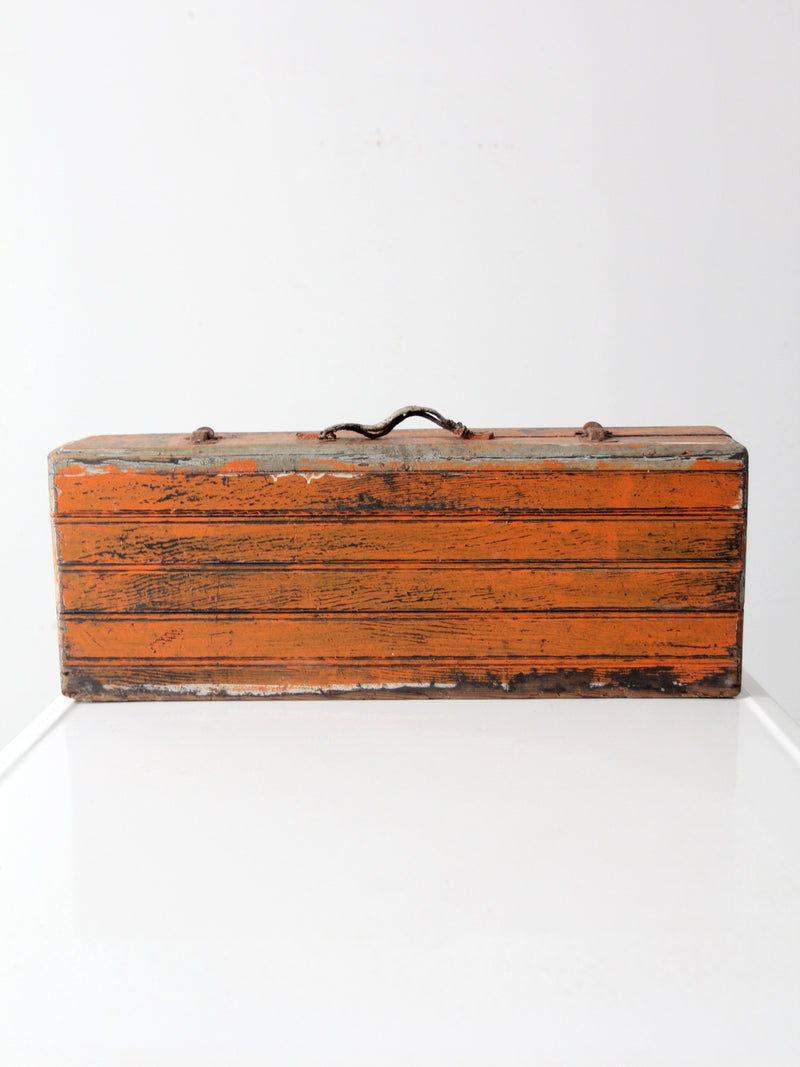 vintage orange wooden tool box