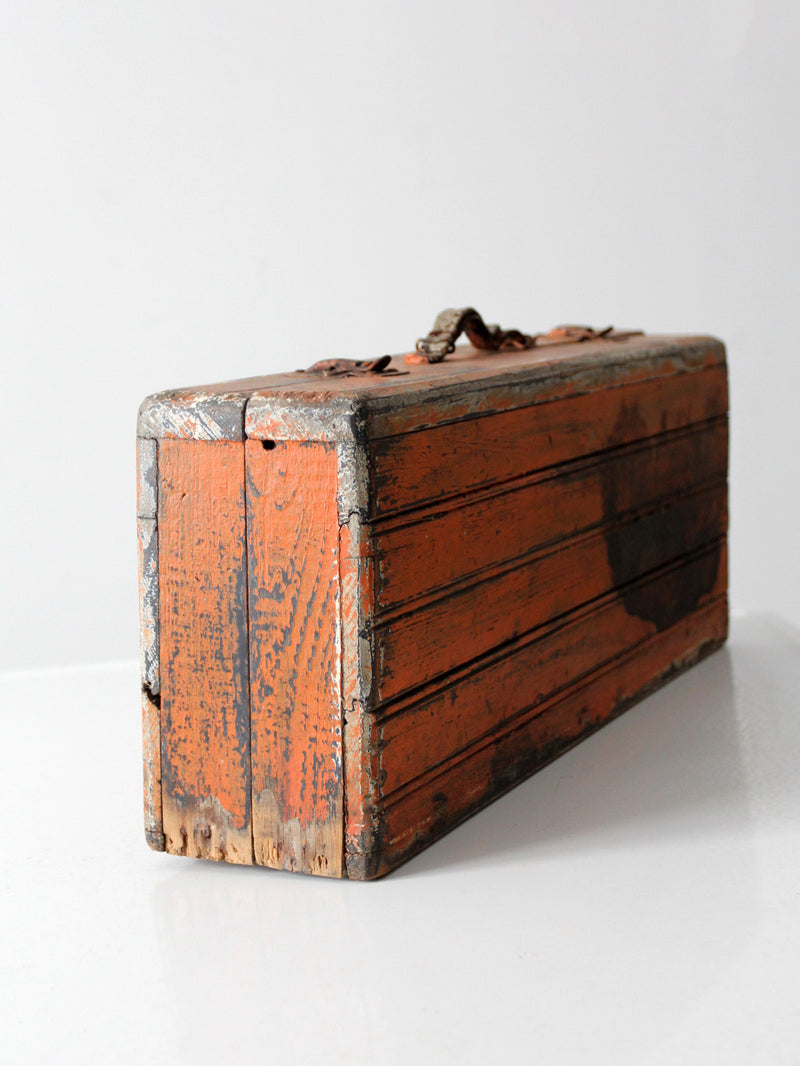 vintage orange wooden tool box
