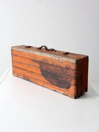 vintage orange wooden tool box