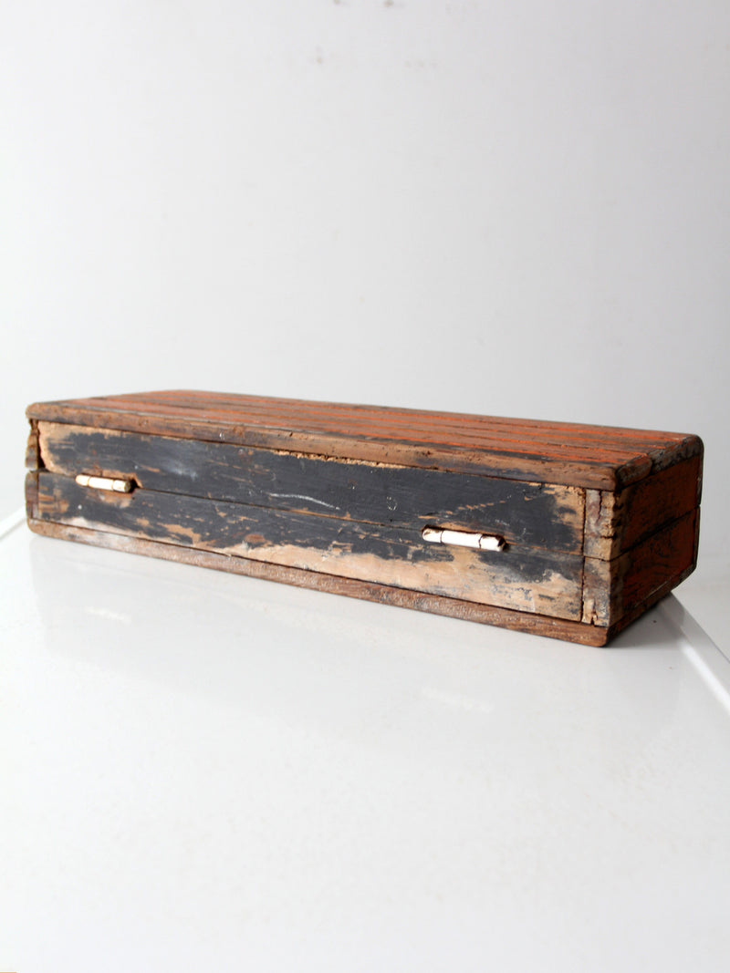 vintage orange wooden tool box