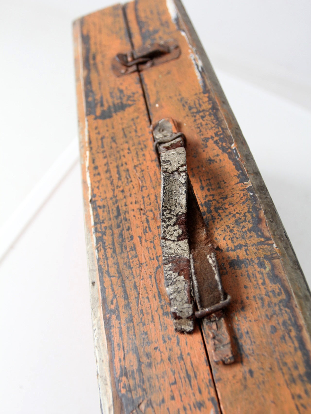 vintage orange wooden tool box