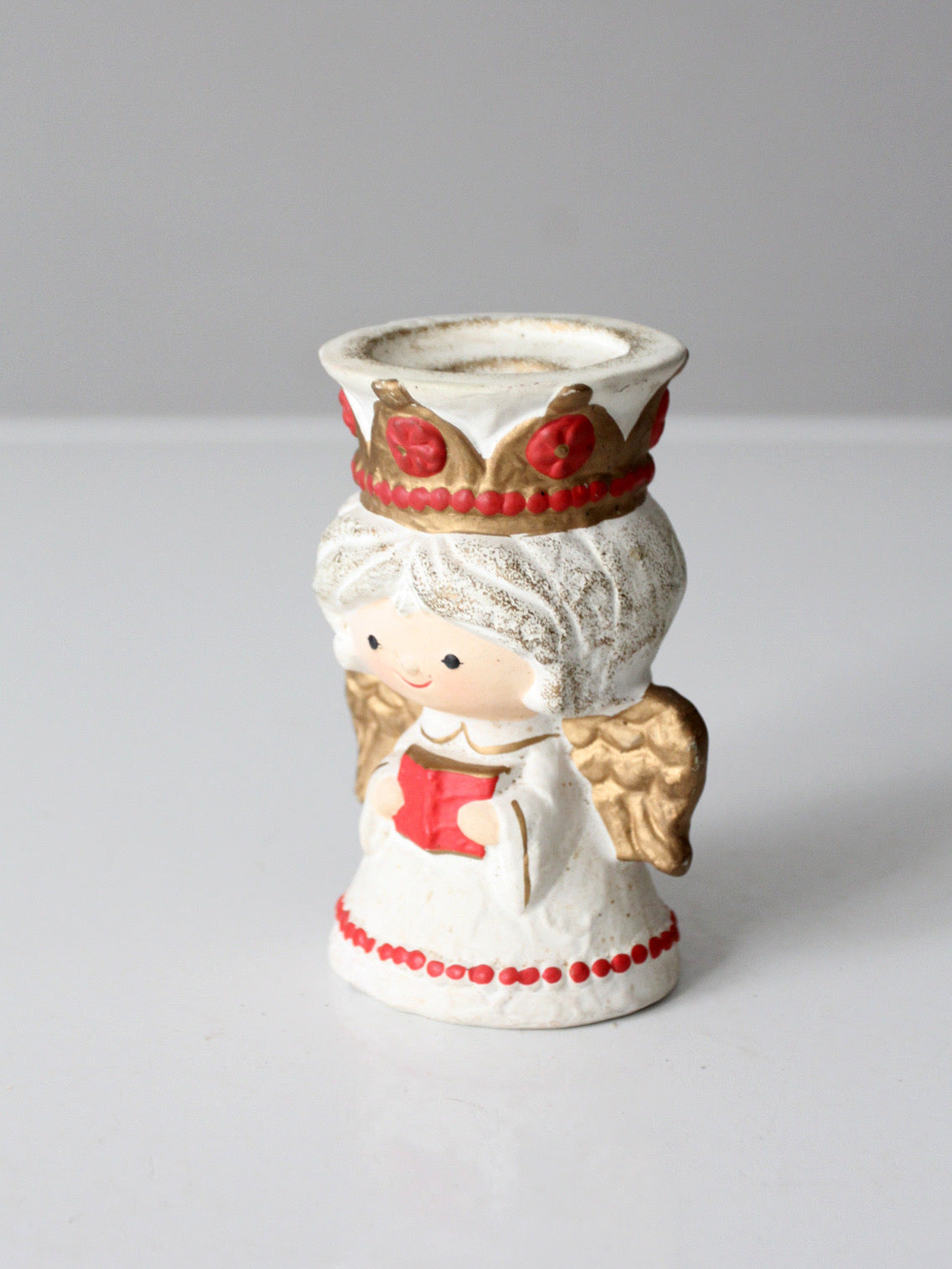 vintaged HomeCo angel candlestick holder