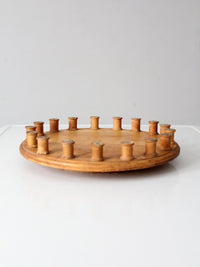 vintage folk art lazy Susan with thread spools