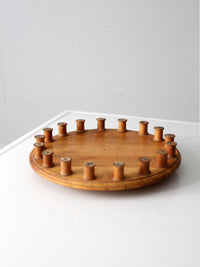 vintage folk art lazy Susan with thread spools